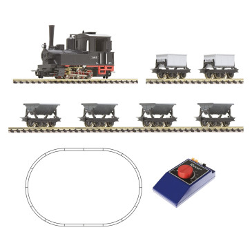 Roco 31035 voie H0e Locomotive à vapeur sur rail léger avec train de camions, voie ovale et transformateur